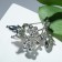 Brooch "Pearls" with glass sheets, white color in silver