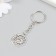 Frill metal "Sun and month" silver 2.4x2.8 cm