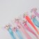 Local Locom "Bow", straight hair, on a hairpin, 32 cm, color mix