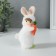 Interior doll "Baby in a bunny costume with carrots" 6x7x15 cm