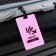 Tag on a rubber suitcase "Life is ABOUT Adventure", pink