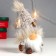 Interior doll "Santa Claus in a knitted cap with fur" 16x9x7 cm