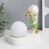 Souvenir Polystone Light "Baby in a white cap, with a gold bubble at the ball" 16.5x8x16 cm