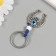Keychain from the evil eye Metal "horseshoe" 3x6.5 cm