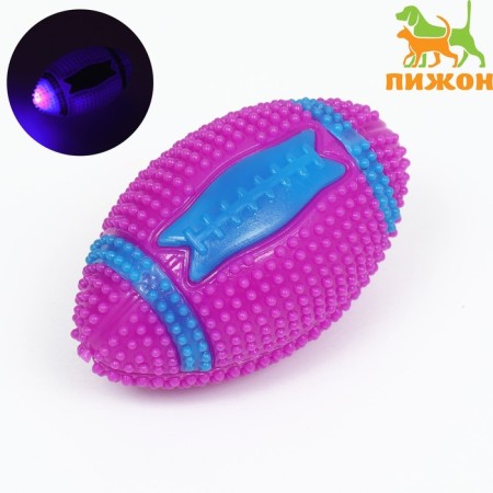 The dog for dogs luminous with the squeezer "Rugby", TPR, 7 cm, pink