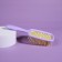 The comb is massage, wide, ventilated, 8.5 × 20.5 cm, PVC box, lilac/yellow color