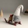 Interior light doll "Dwarf in a shiny cap with a bag of gifts on sleds" 10x26x41 cm