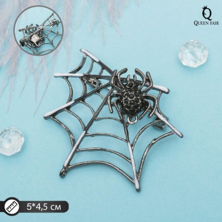 Brooch "Spider in the web", the color is black and white in silver