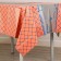 The tablecloth "Squares", 137 × 183 cm., Orange color