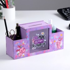 Organizer for the office with a piggy bank 