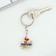 A keychain for graduation "graduate 2024", diam. 3 cm