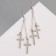 Earrings hanging "rustle" crosses, color mix, 8.5 cm