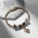Margeri Bracelet on the thread, heart with a drop, l = 18 cm, white-brown color in gold