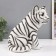 The piggy bank "Tiger white" height is 23.5 cm, width 16 cm, length 23 cm.