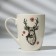 Ceramic mug with a spoon "Deer", 310 ml, white color
