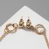 Earrings metal "Rings with a chain", color gold