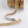 Thermoclay rhinestones, d = 4 mm, width - 10 mm, 4.5 ± 0.5 m, gold color