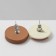 Earrings plastic "cookie" bitten, white-brown color in silver