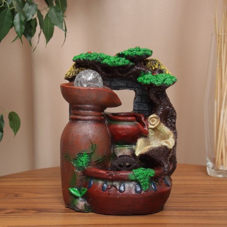 Fountain "Stone barrels under the lush tree" 27x20 cm (with backlight)