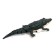 The radio -controlled crocodile, floats, works from the battery, the color is green