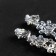 Clips "openwork" drops with curls, white color in silver