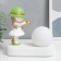 Souvenir Polystone Light "Baby in a green hat, with a gold bubble at the ball" 16.5x8x16 cm