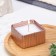 Candle "Square" in a candlestick with narrow faces of gypsum, 7.5x3.5cm, champagne