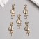 Decor for creativity metal, rhinestones "A cat with a bow on the tail" gold 1.5x4.5 cm