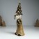 Suvenir Polystone "Santa Claus in a golden outfit, a cap, with a wreath" 10x8x29 cm