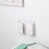 Wallmaning holder for a phone, 10 × 8.7 × 2.8 cm, white color