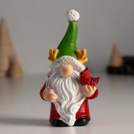 Polystone souvenir "Dwarf in a green hat with horns, with a bird" 4x5.5x10.5 cm