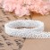 Knitted lace, 14 mm × 15 ± 1 m, fluid-white color