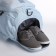 A backpack-snuffle with a zipper, 4 outer pockets, a shoe detachment, blue color