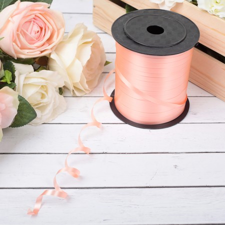 The tape is simple matte, peach, 0.5 cm x 225 m