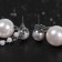 Earrings with pearls "path" to increase, white color in silver