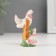 Polystone pigeons in a pink wreath 6*4 cm