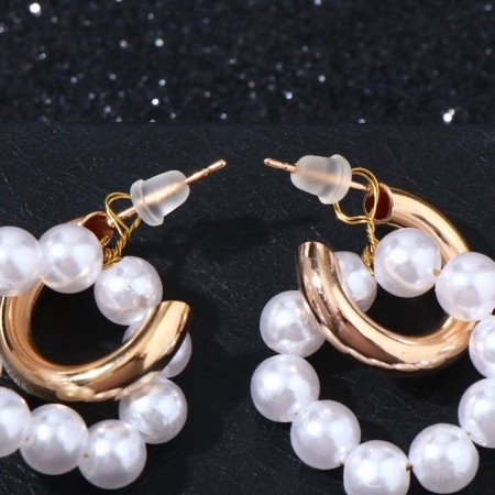 Earrings with the removable element "Transformer" two pearl rings, the color is white in gold-1