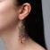 Hanging earrings with rhinestones "Vostok" Dreaming Clover, colored in black silver, 8 cm