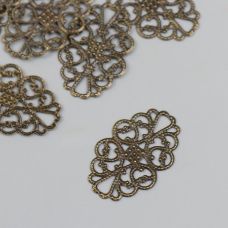 Decorative eelement of bronze 2x3.2 cm