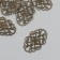 Decorative eelement of bronze 2x3.2 cm