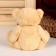 Soft toy "Tender Bear", bow, traces, color mix