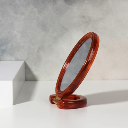 The desktop mirror is a suspended “oval”, bilateral, with an increase, a mirror surface 6 × 9.3 cm, the color “amber” color-2