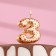 Candle in the Sanata cake, number "3", gold with red stars, 5.5 cm
