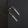Earrings with rhinestones "Geometry" Thin cylinder, white color in gold
