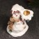 Snowman Snowman with a gift 12cm