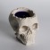 Figure candle in concrete "Crying skull", purple