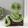New Year's figure "Cobra on the chest" 20 x 17 x 12 cm, light green