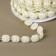 Pearls on threads, flat, 10 mm, 9 ± 1 m, milk color
