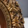 Photo frame Polystone 10x15 cm oval "lush leaves" aged gold 26x20 cm