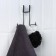 The holder is universal, 14 × 15 cm, the color is black